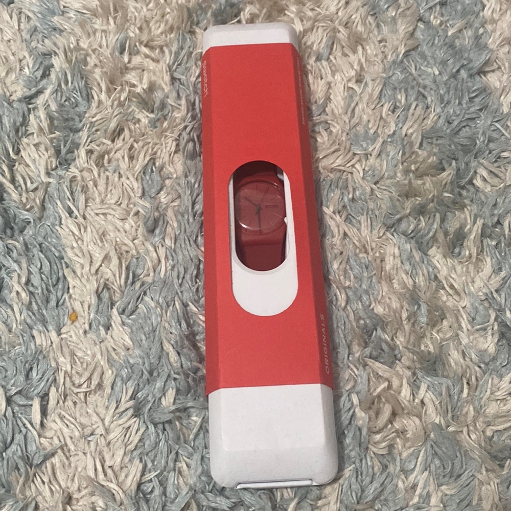 Swatch red watch